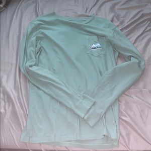 A dark teal vineyard vines shirt